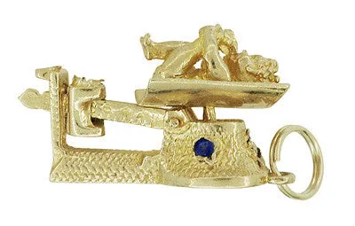 Vintage Baby on a Movable Scale Charm Pendant in 14 Karat Yellow Gold with Ruby, Sapphire, and Diamond